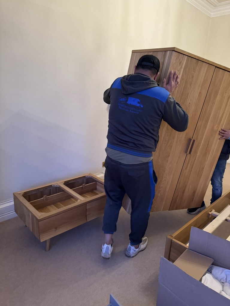 Scot Removals team carefully preparing furniture