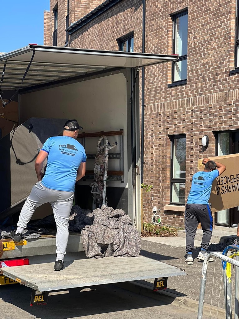 Scot Removals crew loading a removal van